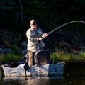 Doug-Elliott_fish-on-standing-in-boat_2018.jpg