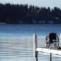 Lois Smith, wheelchair on dock at Dragon Lake 2014 1.JPG